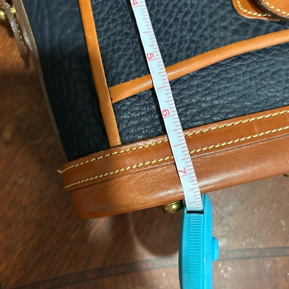 Dooney & Bourke Black and Tan Crossbody Bag with Signature Brass Lock - Picture 13 of 14